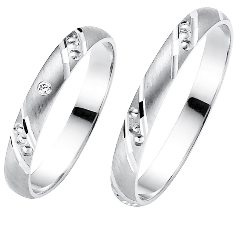 Frontale Aufnahme von Eheringe aus rhodiniertem Silber 925 mit Zirkonia und Mustern aus Kreisen