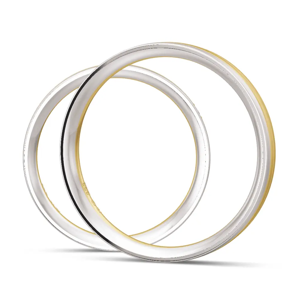 Trauringe aus Gelbgold und Weißgold schmal längsmatt mit Diamant seitlich