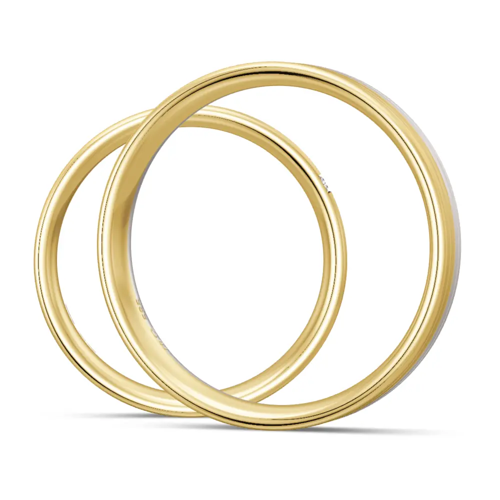 Trauringe aus Gelbgold und Weißgold mit Längstmattierung und 3 Rillen  und Diamant seitlich