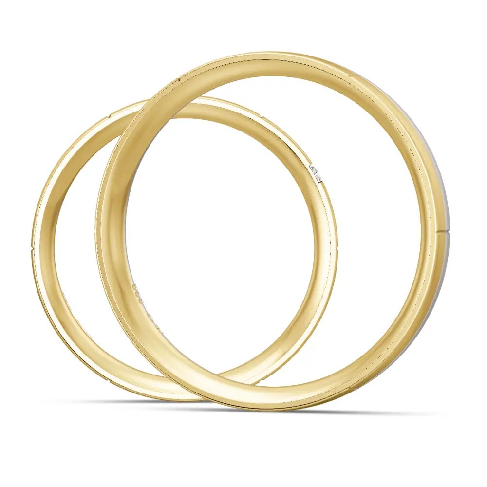 Trauringe aus Gelbgold und Weißgold mattiert mit 2 Diamanten und Rillen seitlich