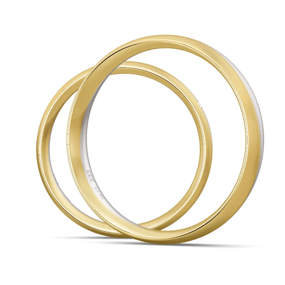 Eheringe aus Gelbgold und Weißgold matt gerundet mit 2 Rillen und Diamant seitlich
