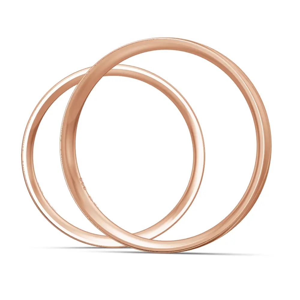 Trauringen aus Roségold mit Mattierung und geschwungenen Rillen und Diamant seitlich