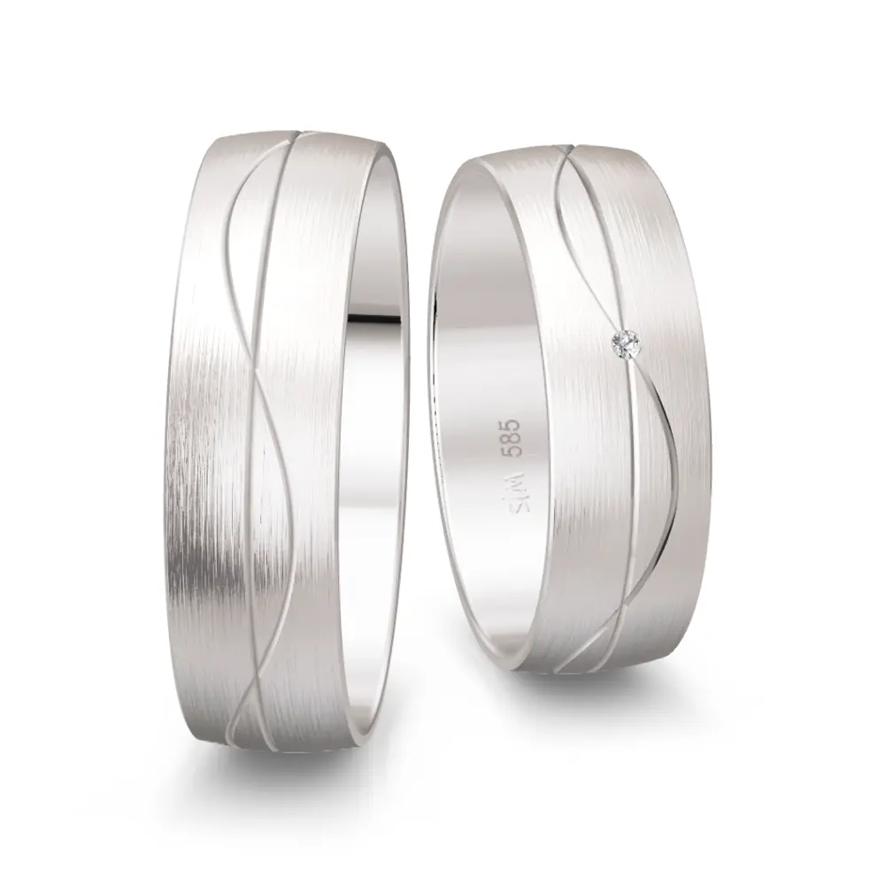 Weissgold Trauringe mit Diamant und Rillenmuster breit matt