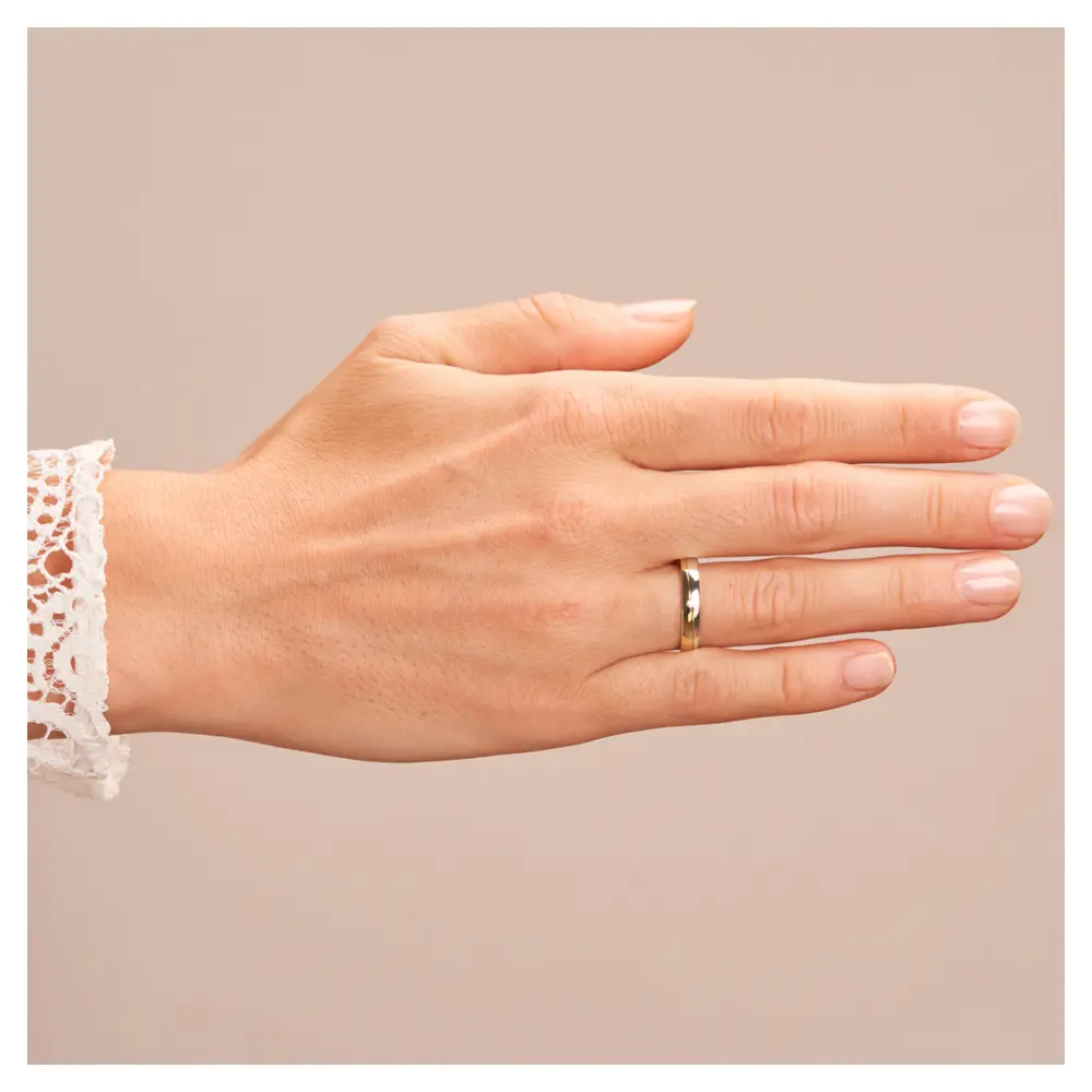 Weissgold und Gelbgold Trauringe poliert mit Diamant auf Hand