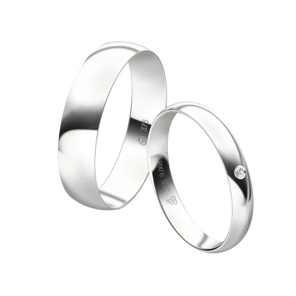 Weißgold Eheringe mit Diamanten in zwei Breiten und Diamant im Damenring