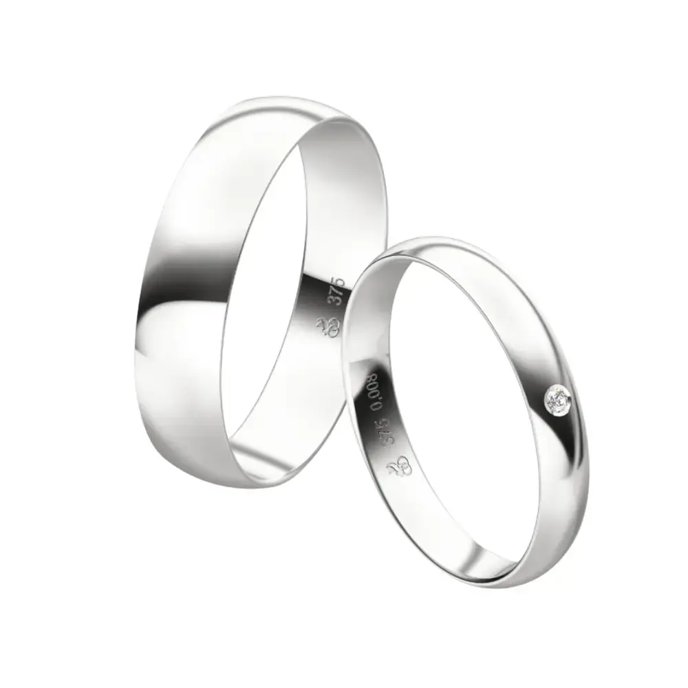 Weißgold Eheringe mit Diamanten in zwei Breiten und Diamant im Damenring