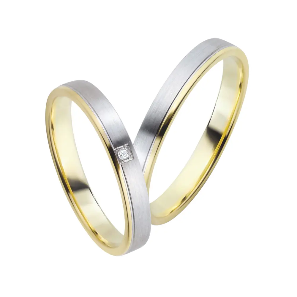 Gelbgold und Weissgold Eheringe mit Diamanten und Mattierung