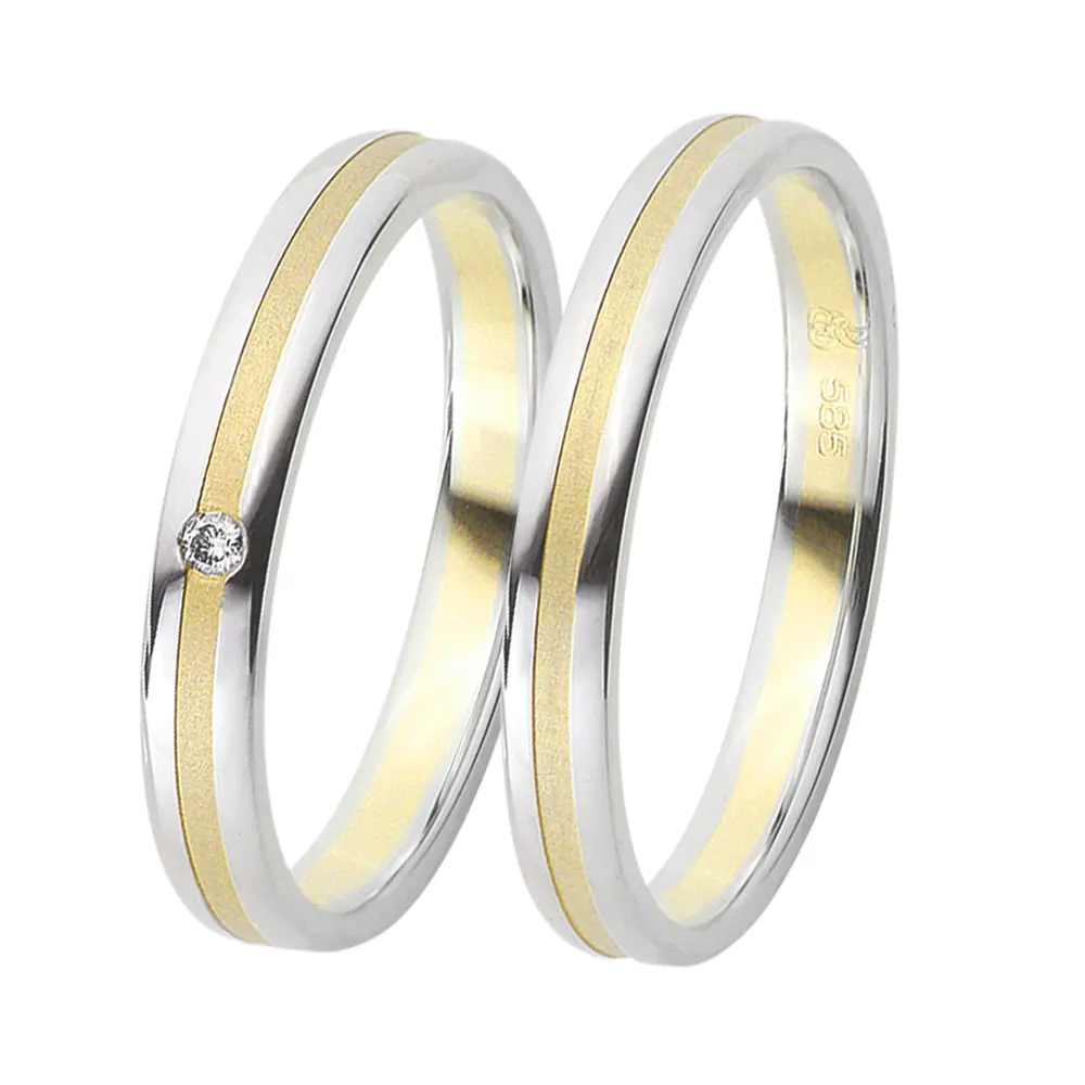Gelbgold und Weissgold Eheringe mit Diamanten und sandmattem Mittelstreifen
