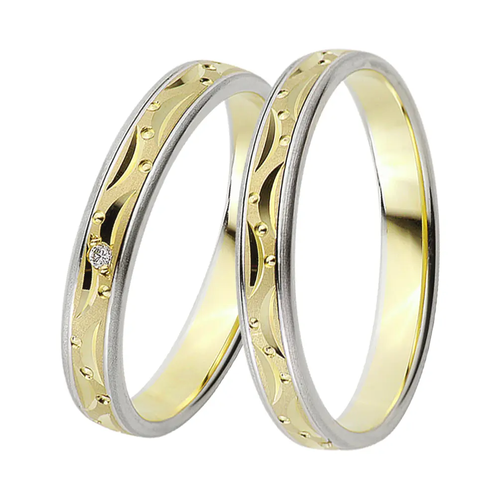 Gelb-&Weissgold Eheringe mit Mustern aus Kreisen und Halbmonden und Diamant