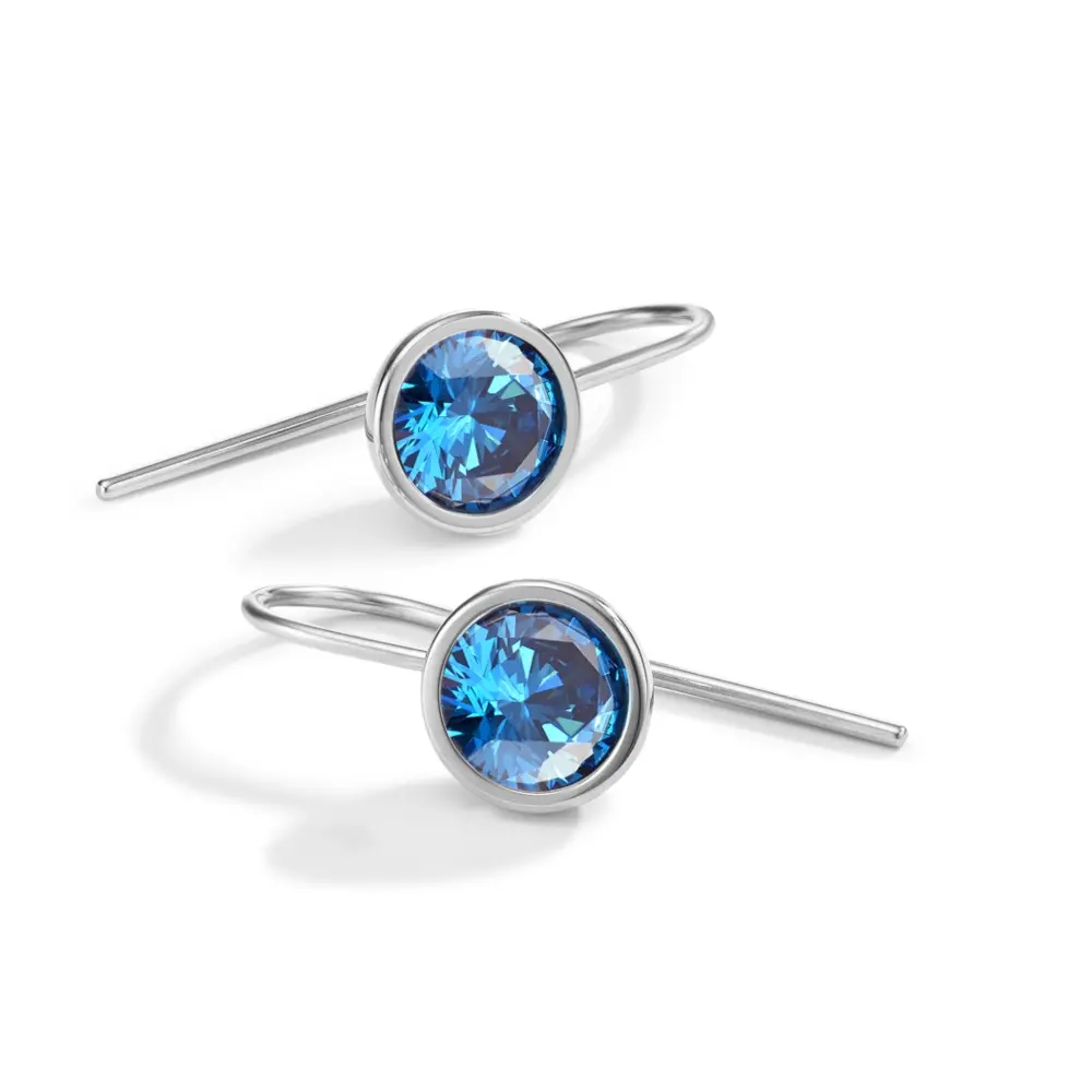Edelstahl Ohrhänger mit blauen Zirkonia liegend