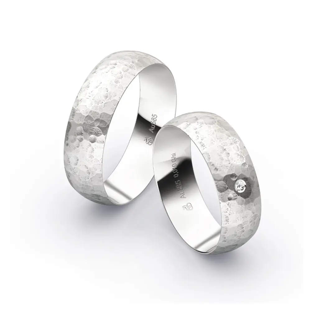 Einmalige Eheringe aus Weissgold mit Diamanten in besonderem Design 5086