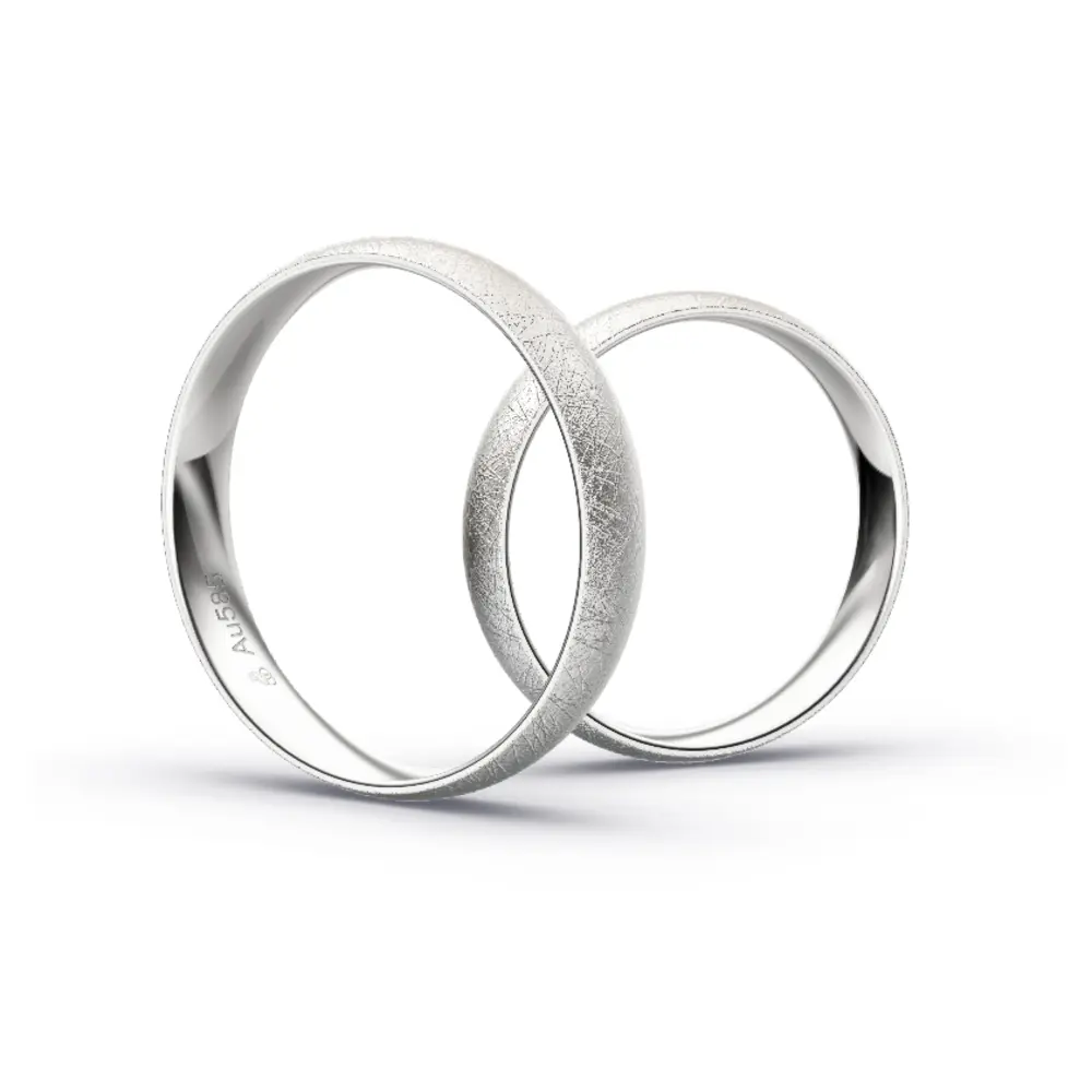 Aufnahme von schlichten eismatten Trauringen aus Weissgold mit Diamant mit 4 mm Breite
