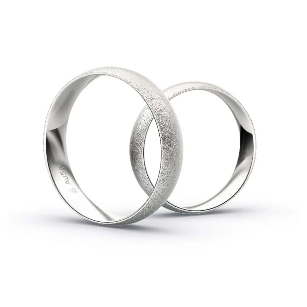 Aufnahme von schlichten eismatten Trauringen aus Weissgold mit Diamant mit 5 mm Breite