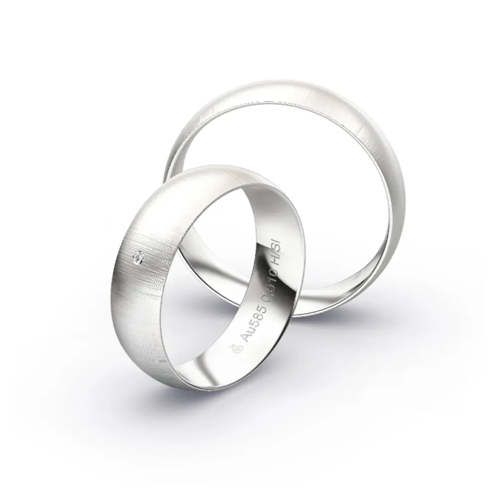 Aufnahme von Eheringen aus Weissgold mit Diamanten und Querbürstung in 6 mm Breite