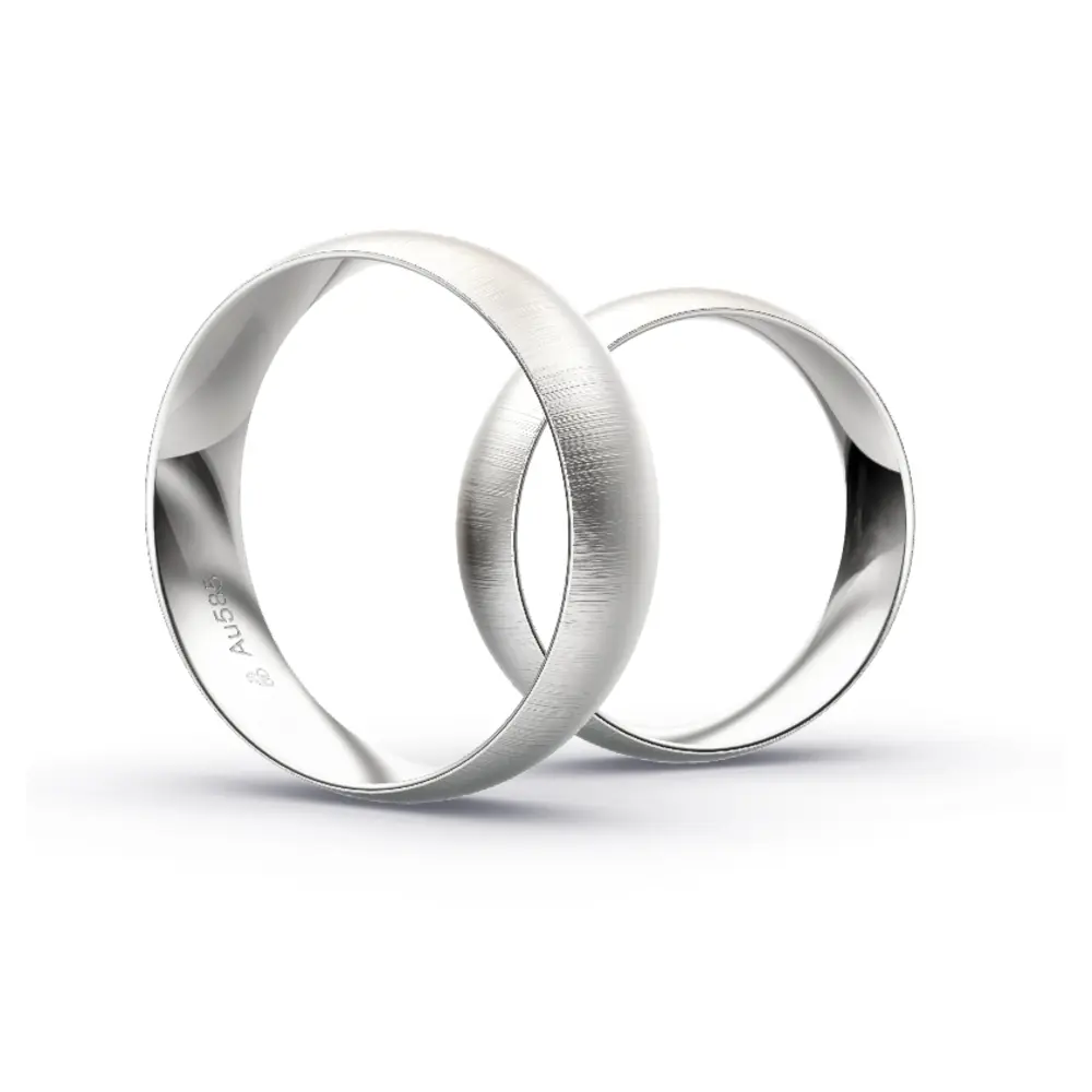 Aufnahme von Eheringen aus Weissgold mit Diamanten und Querbürstung in 6 mm Breite
