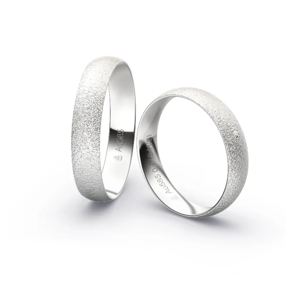 Aufnahme von Eheringen aus Weissgold mit Körnung und Diamanten und 4,5 mm Breite