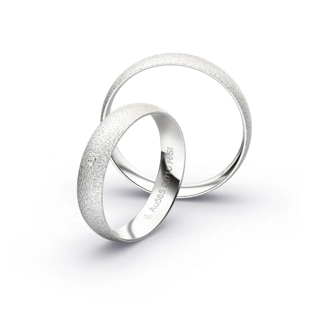 Aufnahme von Eheringen aus Weissgold mit Körnung und Diamanten und 4,5 mm Breite