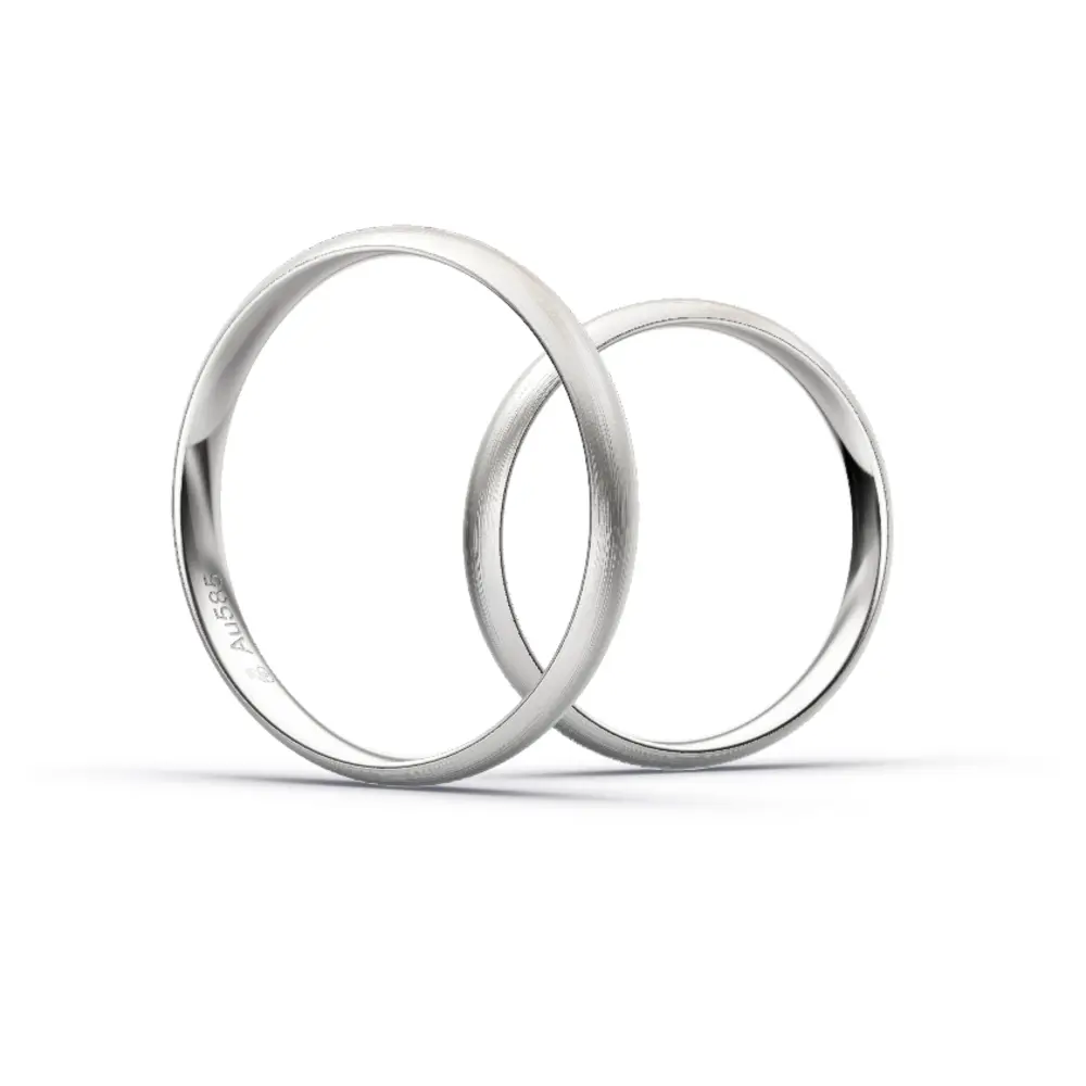 Aufnahme von schlichten matten Trauringen aus Weissgold mit Diamanten mit 3 mm Breite