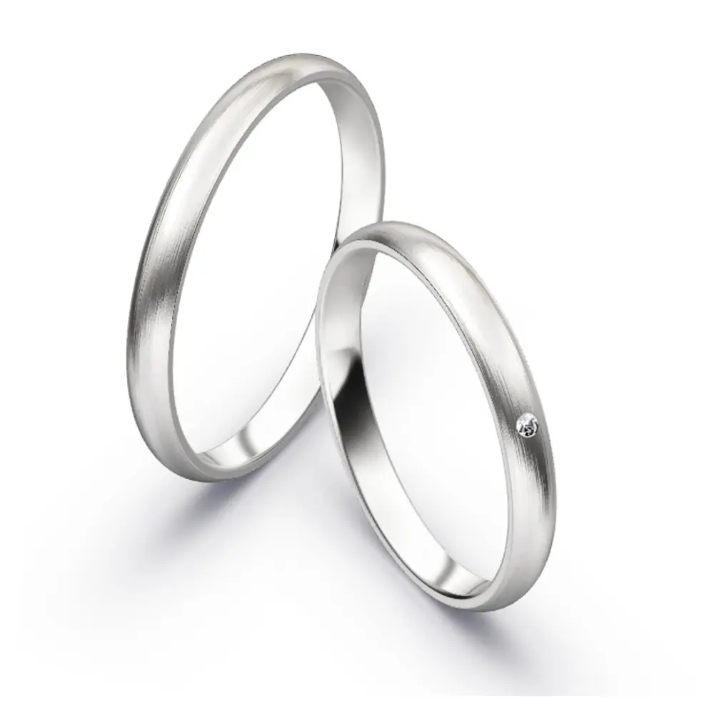 Einzigartige Weißgold Eheringe mit Diamanten und Längsmattierung 