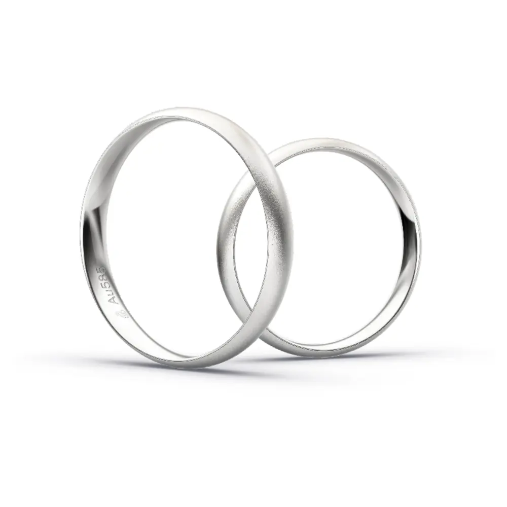 Aufnahme von schlichten sandmatten Trauringen aus Weissgold mit Diamanten mit 3,5 mm Breite