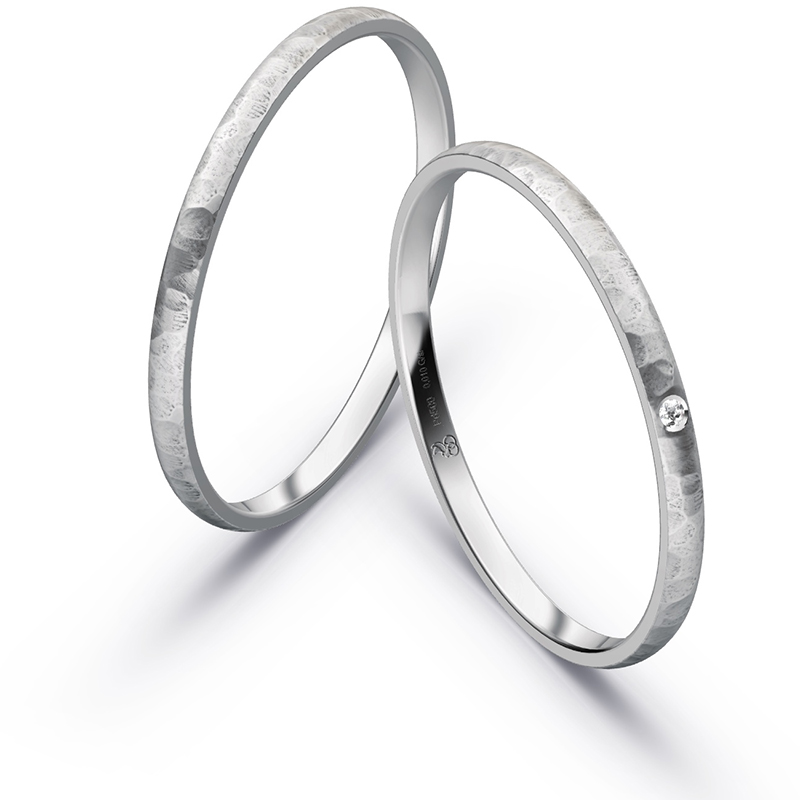 Hübsche Eheringe aus Palladium 500 mit Hämmerung und Diamanten 7910