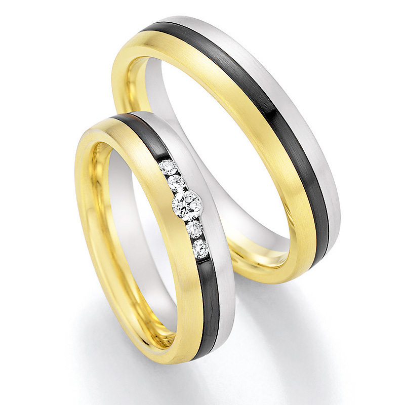 Aufnahme von Eheringen aus Gelbgold&Weißgold&Zirconium trikolor mit fünf weißen Diamanten 