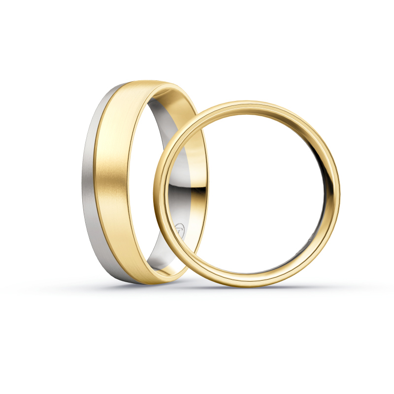 Aufnahme von Eheringen aus Palladium 500/Gelbgold matt mit 5 Diamanten in asymmetrischer Vertiefung 