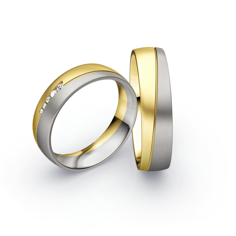 Aufnahme von Eheringen aus Palladium 500/Gelbgold matt mit 5 Diamanten in asymmetrischer Vertiefung 