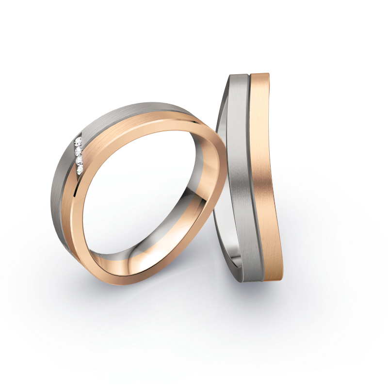 Aufnahme von Eheringen aus Rosègold & Palladium 500 bicolor längsmattiert mit vier Diamanten 