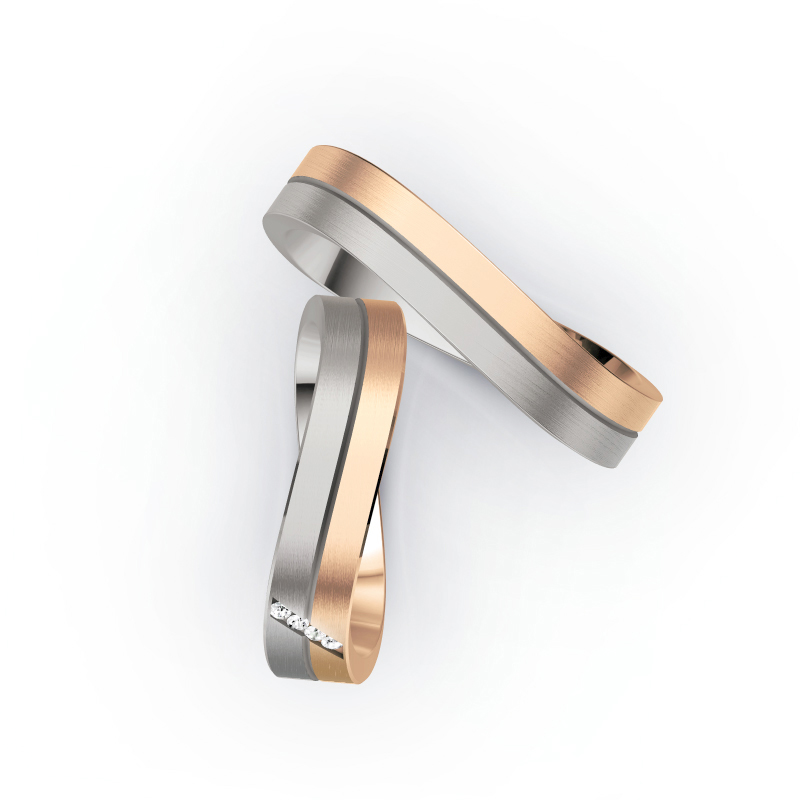 Aufnahme von Eheringen aus Rosègold & Palladium 500 bicolor längsmattiert mit vier Diamanten 