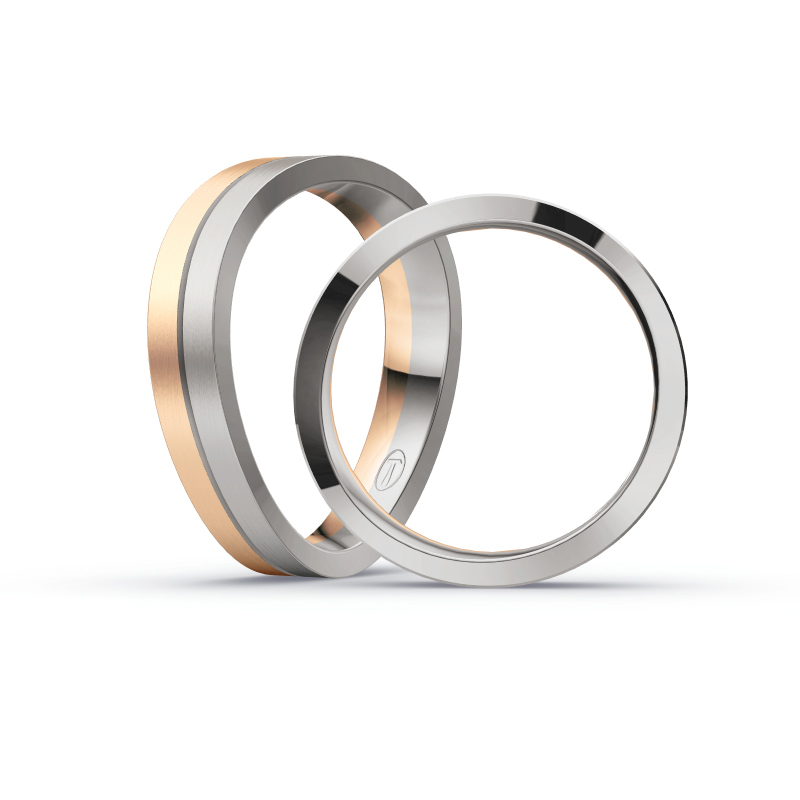 Aufnahme von Eheringen aus Rosègold & Palladium 500 bicolor längsmattiert mit vier Diamanten 