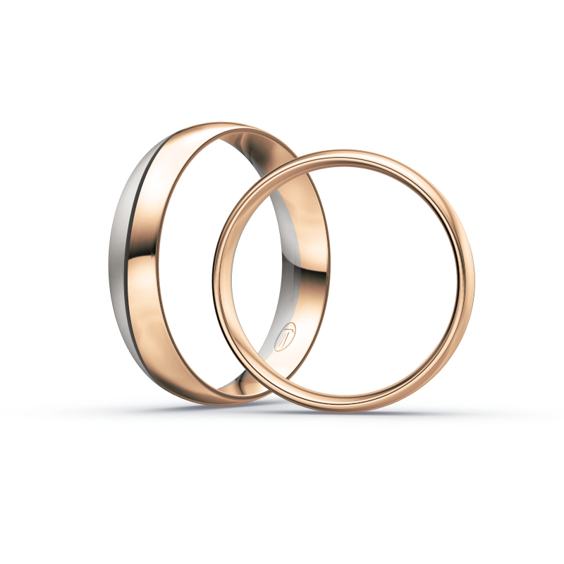 Aufnahme von Eheringen in Rotgold und Palladium 500 mit 7 Diamanten verschiedener Größe