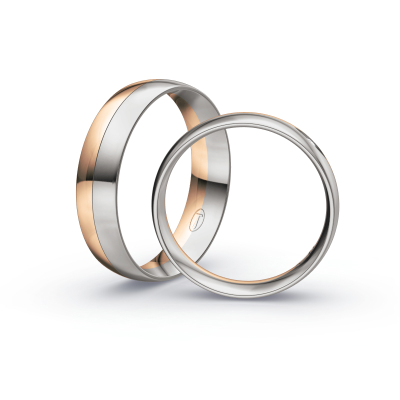 Aufnahme von Trauringen aus Palladium 500/Roségold hochpoliert mit 3 Diamanten