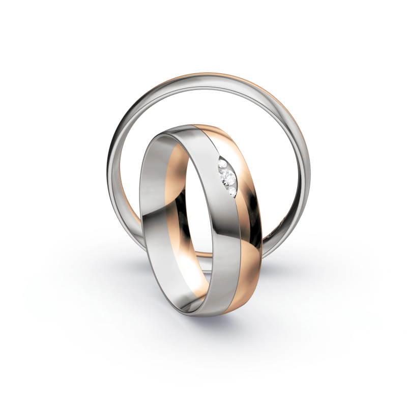 Aufnahme von Trauringen aus Palladium 500/Roségold hochpoliert mit 3 Diamanten