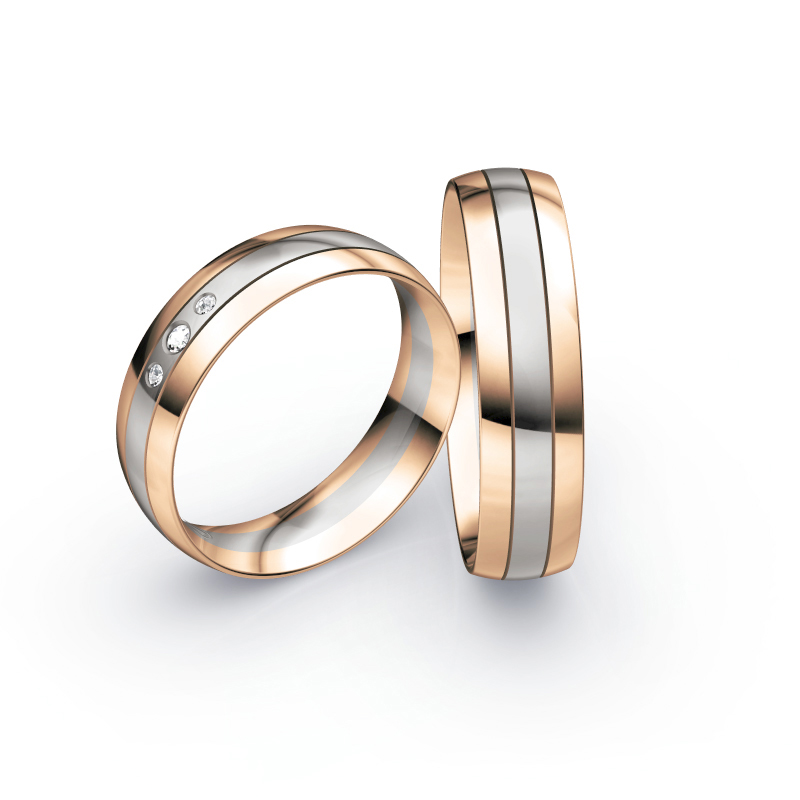 Aufnahme von Eheringen aus Palladium 500 & Roségold mit 3 mittig gesetzten Diamanten 