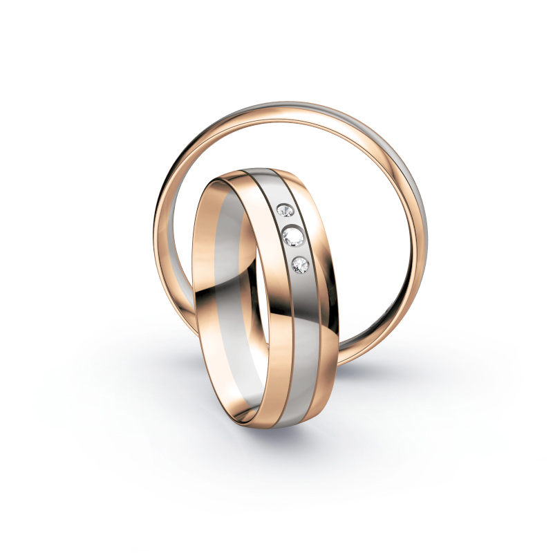 Aufnahme von Eheringen aus Palladium 500 & Roségold mit 3 mittig gesetzten Diamanten 