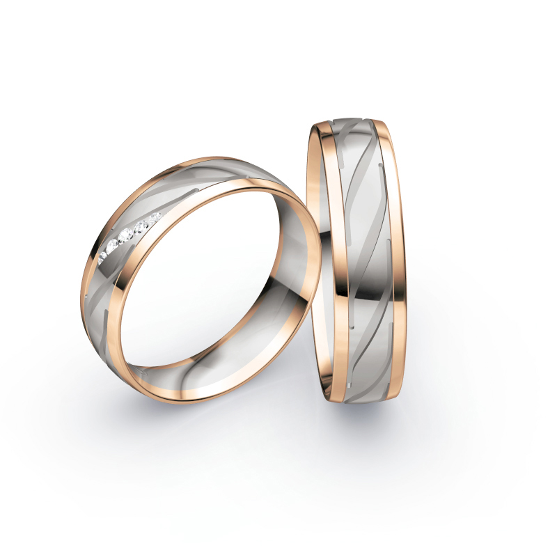 Aufnahme von Eheringen in Palladium 500 & Roségold mit schrägen Rillen und fünf Diamanten 