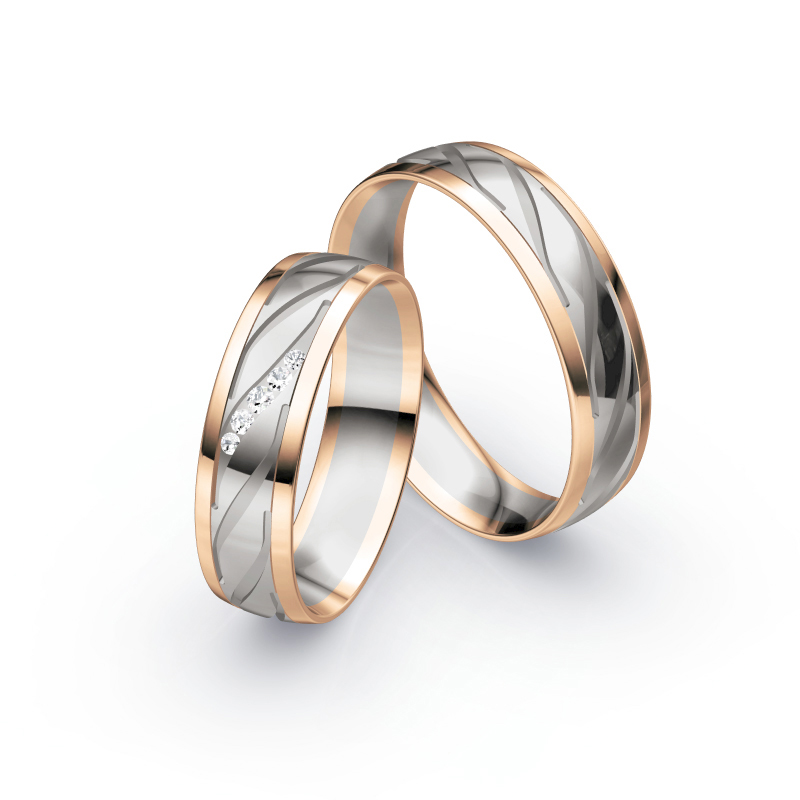 Aufnahme von Eheringen in Palladium 500 & Roségold mit schrägen Rillen und fünf Diamanten 