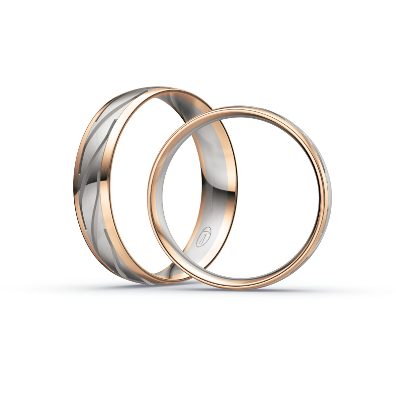 Aufnahme von Eheringen in Palladium 500 & Roségold mit schrägen Rillen und fünf Diamanten 