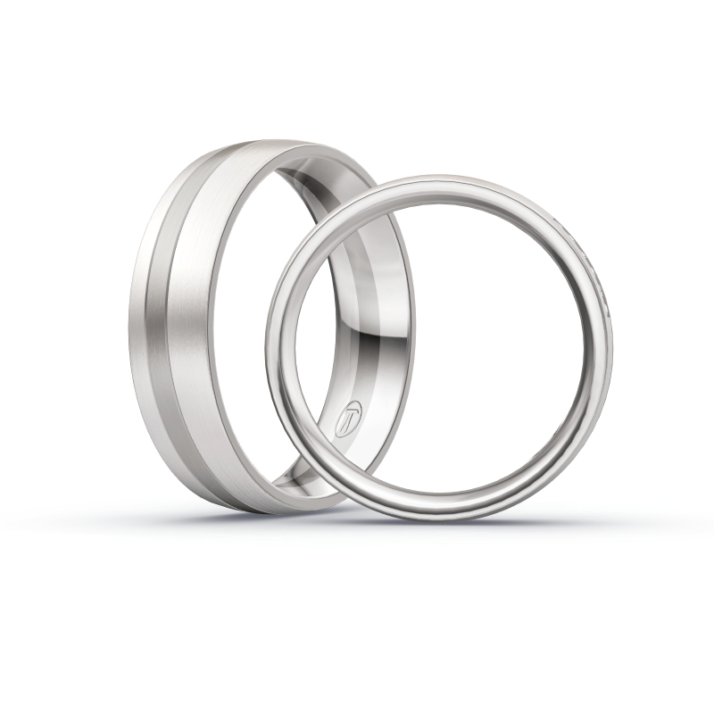 Aufnahme von Trauringen in Palladium 500 und Weißgold mit zwölf Diamanten