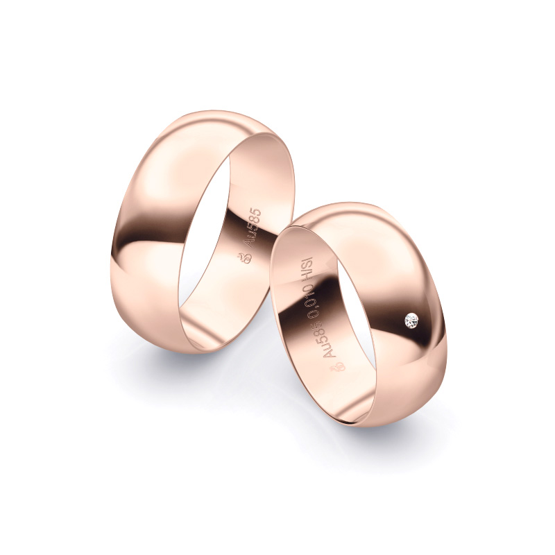 Eheringe, 7 mm breit aus poliertem Roségold mit weißem Diamanten