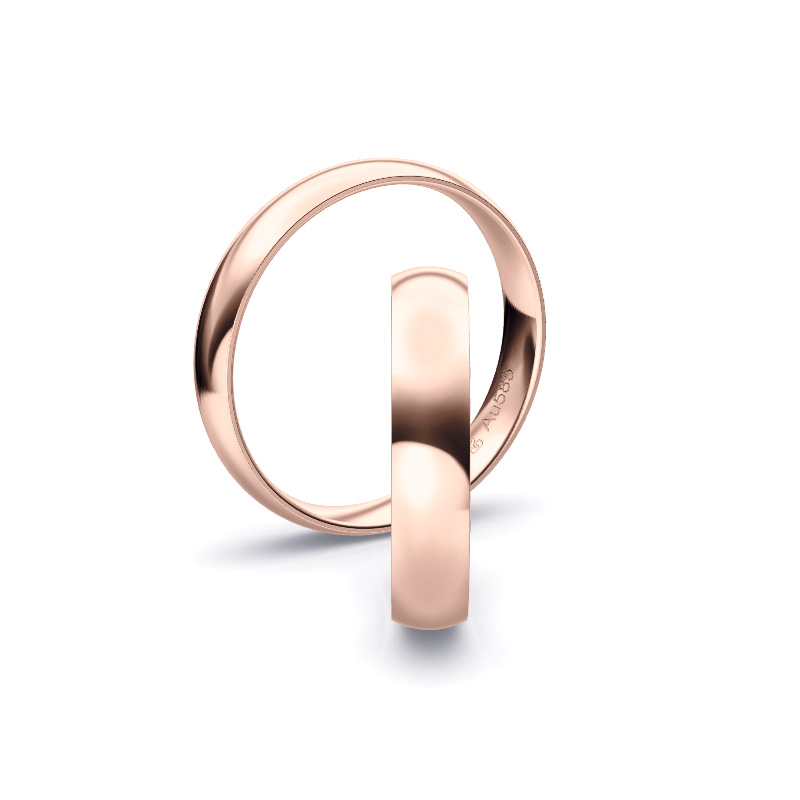 Aufnahme von schlichten polierten Trauringen aus Rosegold mit 4 mm Breite