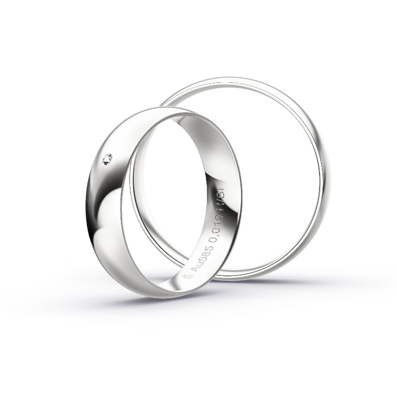 Aufnahme von polierten schlichten Trauringen aus Weissgold mit Diamanten mit 5 mm Breite