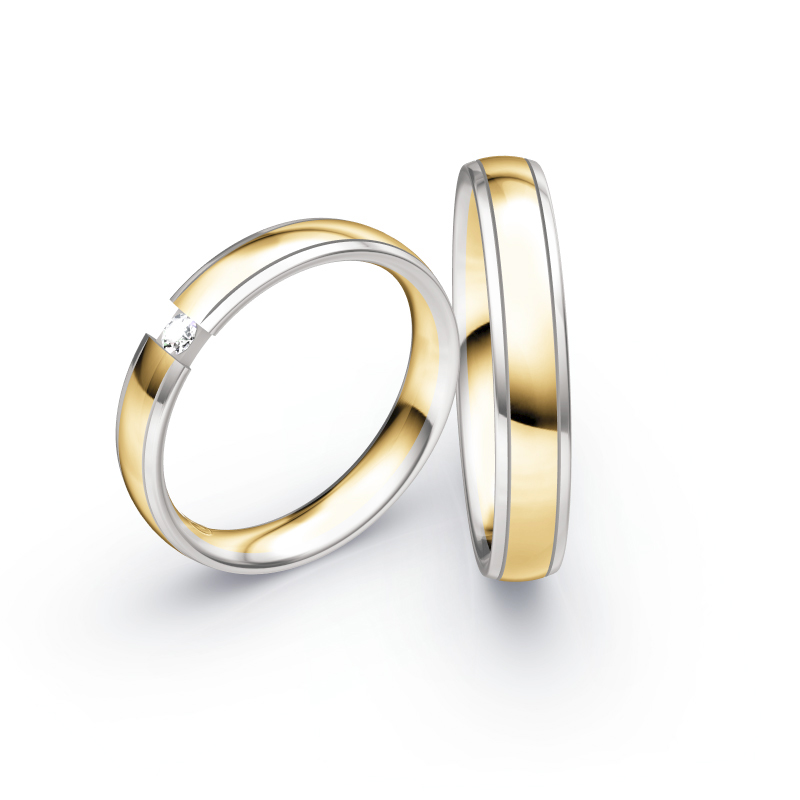 Aufnahme von Eheringen aus Weißgold und Gelbgold mit rundem Diamanten 
