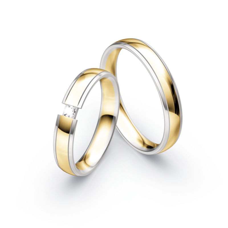 Aufnahme von Eheringen aus Weißgold und Gelbgold mit rundem Diamanten 