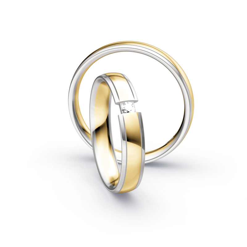 Aufnahme von Eheringen aus Weißgold und Gelbgold mit rundem Diamanten 