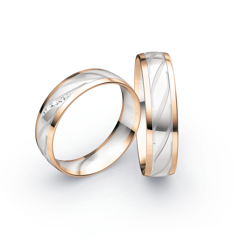 Aufnahme von Eheringen in Rotgold/Weißgold poliert mit Rillen und 5 Diamanten