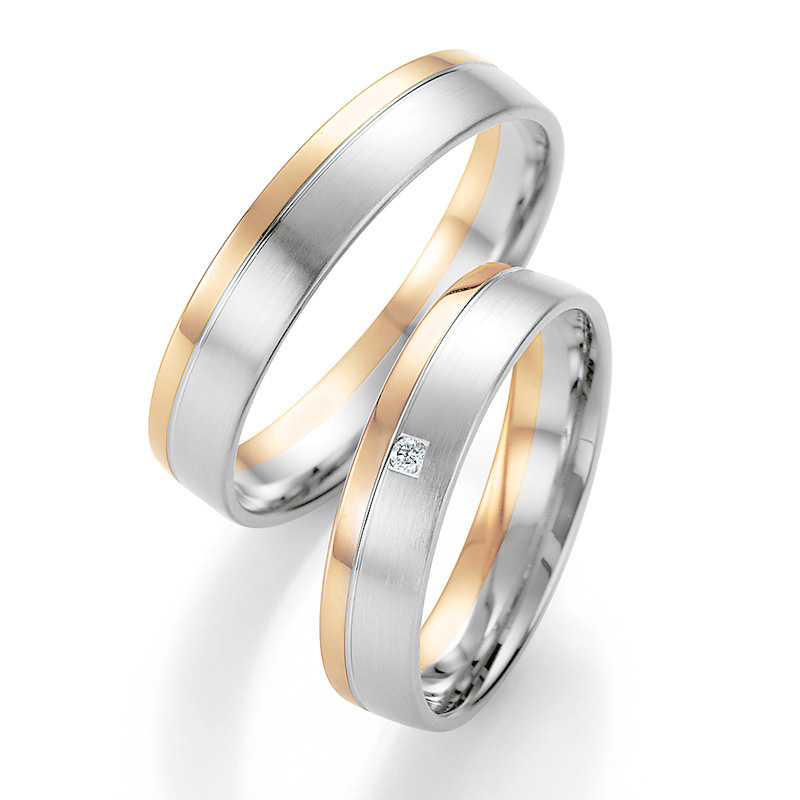 Aufnahme von Eheringen aus Weißgold&Rotgold bicolor langsmattiert mit Diamanten und poliertem Rand