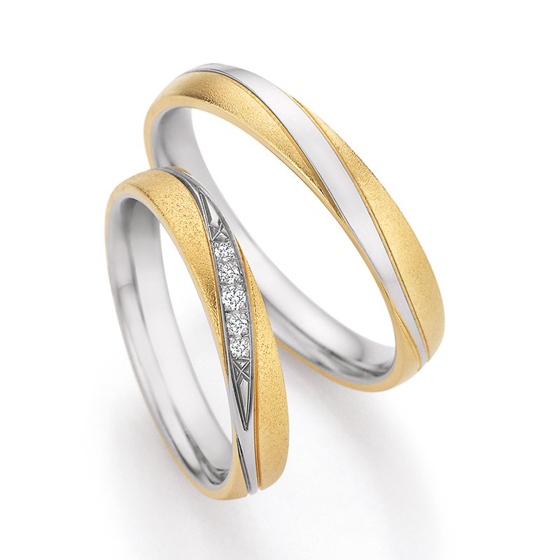 Bicolor Eheringe aus Platin mit 5 Diamanten in diagonaler Vertiefung 9255