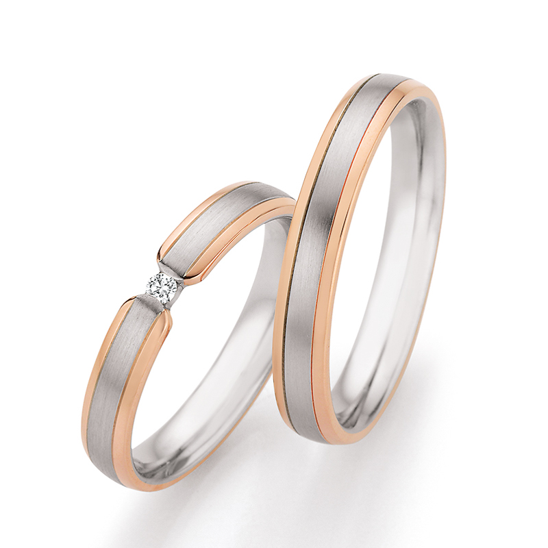 Zweifarbige Eheringe aus 585 Rotgold & Platin mit schwebendem Brillanten